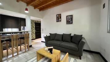 Superior Apartment, City View | Living area | TV