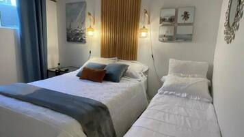 1 habitación, tabla de planchar con plancha, wifi y ropa de cama