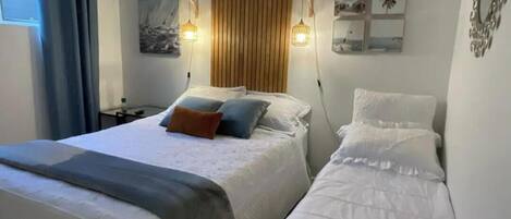 1 habitación, tabla de planchar con plancha, wifi y ropa de cama