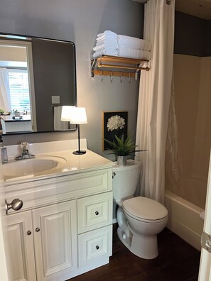 Hair dryer, towels, soap, shampoo