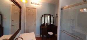 Shower, towels, soap, toilet paper