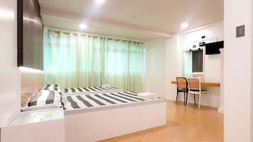 Desk, laptop workspace, blackout drapes, free WiFi