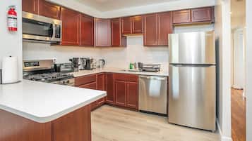 Comfort Apartment, Balcony | Private kitchen | Coffee/tea maker, electric kettle, dining tables