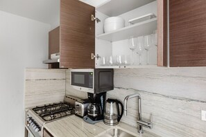 Fridge, microwave, oven, dishwasher - Hip Kips Bay Studio w/ Gym & W/D, close to Park Ave, by Blueground (New York)