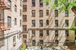 Exterior - Great East Village 1BR w/ Courtyard, Gym, A/C, Elev & W/D, by Blueground (Downtown)