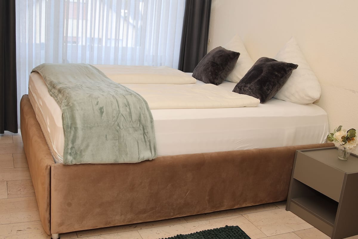 Down duvets, Select Comfort beds, laptop workspace, soundproofing