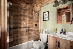 Shower, hair dryer, towels, shampoo