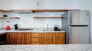 Fridge, microwave, stovetop, coffee/tea maker