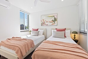 Deluxe Apartment, Balcony, Beach View | Iron/ironing board, free WiFi - Modern Apartment with Esplanade Views (Cairns North)
