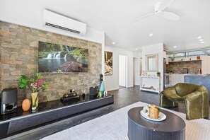 Living room - Modern Apartment with Esplanade Views (Cairns North)