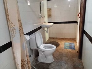 Ducha, toallas, jabón y champú