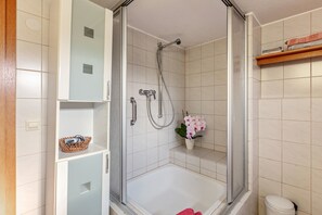 Shower, free toiletries, hair dryer, towels