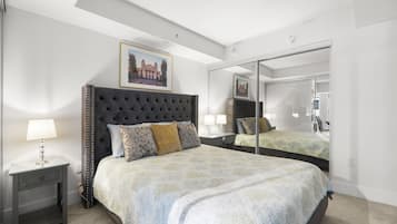 Deluxe Condo, 1 Bedroom, Kitchen, City View | 1 bedroom, desk, laptop workspace, iron/ironing board