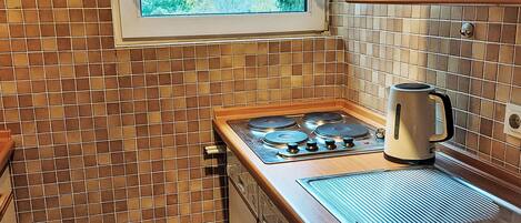 Fridge, microwave, toaster, cookware/dishes/utensils