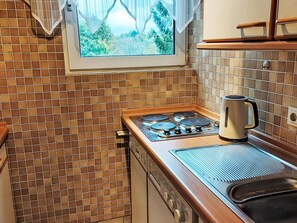 Fridge, microwave, toaster, cookware/dishes/utensils