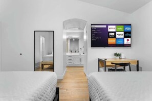 Iron/ironing board, travel crib, WiFi, bed sheets