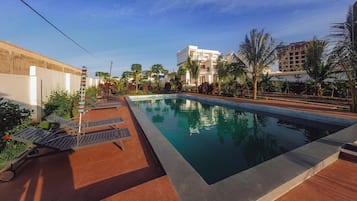Outdoor pool, pool umbrellas, pool loungers