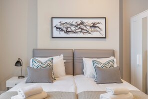 4 habitaciones, tabla de planchar con plancha, wifi y ropa de cama 