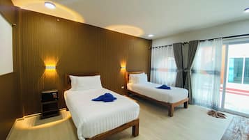 Chambre Supérieure avec lits jumeaux, vue jardin | Coffres-forts dans les chambres, Wi-Fi gratuit