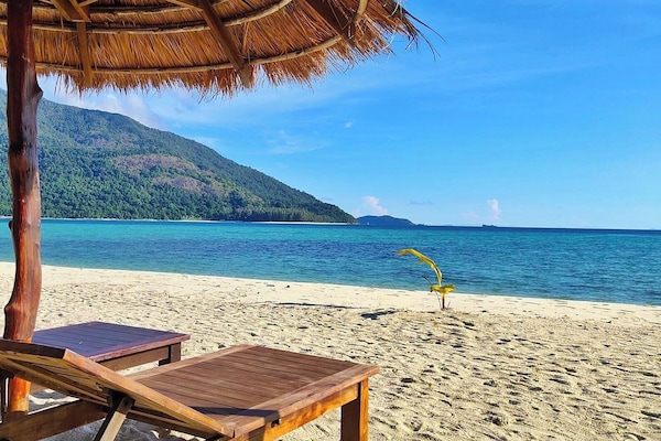 On the beach, white sand, beach bar