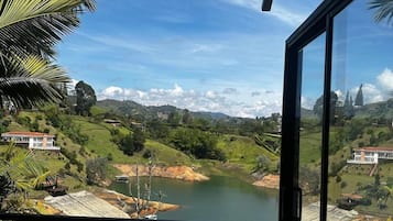 Premium Room | Living area | 32-inch flat-screen TV with cable channels