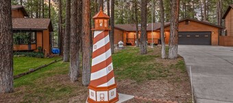 Luna's Lighthouse | Fun Snowbowl Cabin | Firepit, Pool Table & Arcade Games