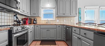 Spacious beachfront retreat for 13