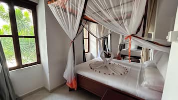 Family Triple Room, Private Bathroom, Garden View | 1 bedroom, in-room safe, individually decorated, individually furnished