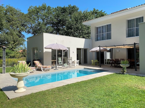 Modern house with swimming pool near the coast