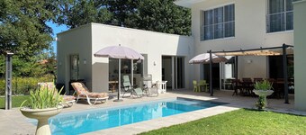 Modern house with swimming pool near the coast