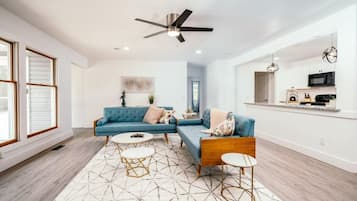 TV, fireplace, books, offices