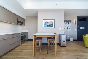 Fridge, microwave, oven, stovetop - Elegant Flat on Tennyson Street w/ Balcony + Rooftop Patio (Denver)