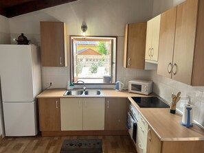 Fridge, microwave, oven, coffee/tea maker