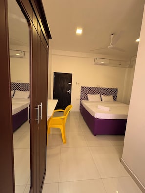 Desk, laptop workspace, free WiFi, bed sheets