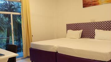 Desk, laptop workspace, free WiFi, bed sheets