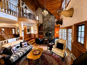 Smart TV, fireplace, books, music library