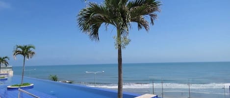 2 outdoor pools, open 10:00 AM to 7:00 PM, pool loungers