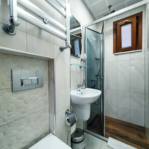 Shower, hair dryer, slippers, towels