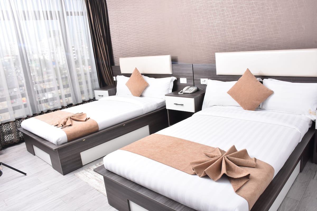 Twin Room, City View | Laptop workspace, free WiFi, bed sheets, wheelchair access