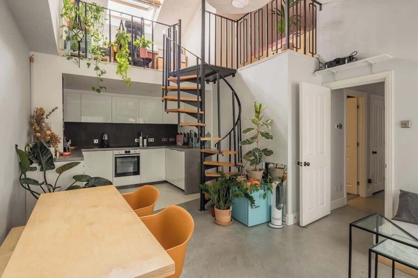 The flat is filled with lots lights and plants that make you feel like waking up in a green indoor garden.