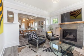 TV, fireplace, books