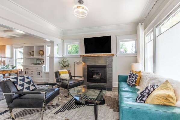 TV, fireplace, books