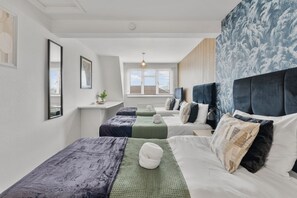 4 bedrooms, iron/ironing board, WiFi, bed sheets