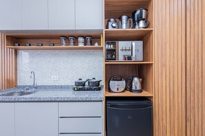 Comfort Apartment, City View | Private kitchen | Fridge, microwave, stovetop, coffee/tea maker