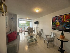 Apartamento família | Área de estar