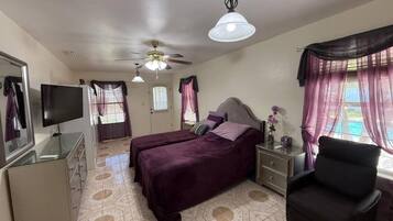 4 bedrooms, desk, iron/ironing board, travel cot