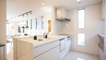 Fridge, microwave, stovetop, cookware/dishes/utensils