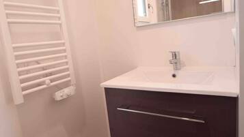 Hair dryer, towels, toilet paper