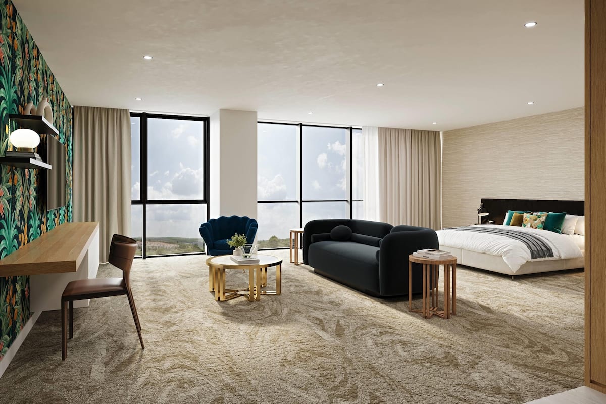 Deluxe King Suite | Individually furnished, desk, soundproofing, rollaway beds