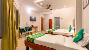 Deluxe Room | Desk, blackout drapes, iron/ironing board, bed sheets
